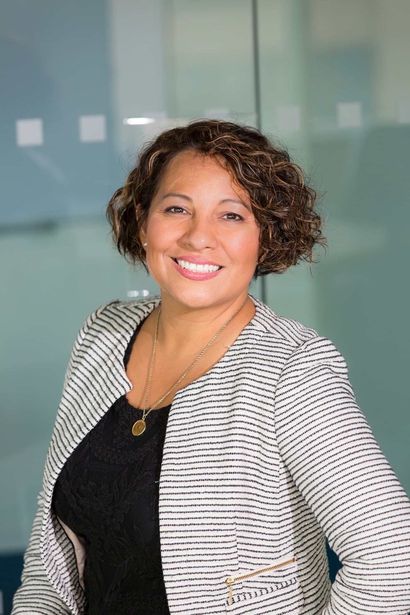 Smiling woman in a blazer